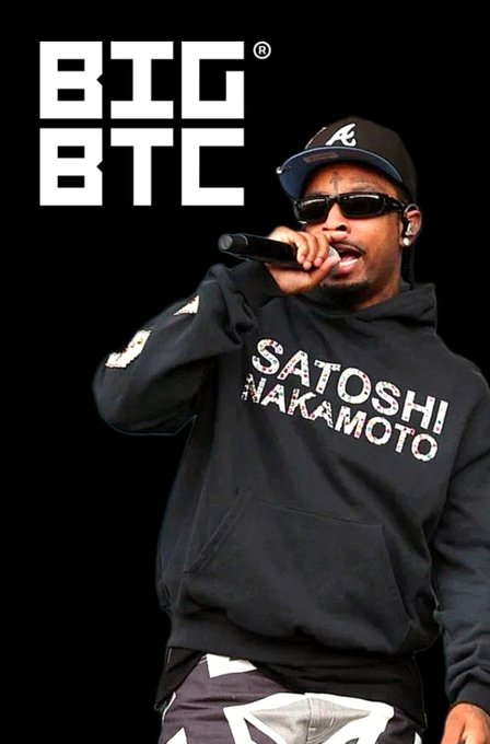 A graphic featuring a rapper wearing a black 'SATOSHI NAKAMOTO' hoodie and sunglasses while holding a microphone, with the stylized text 'BTC BTC' in the upper left corner.