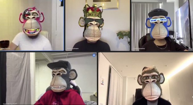 The image features a group of six people wearing gorilla masks, all sitting at their desks with computer screens in front of them. The masks are colorful and unique, adding an element of fun and creativity to the scene. The caption reads "CALLING THE CLUB" which suggests that these individuals might be participating in a virtual meeting or event related to the club they belong to.
