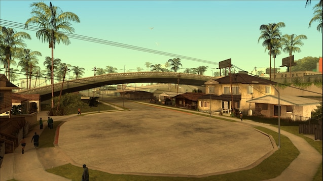 A video game scene depicting a suburban neighborhood with palm trees, houses, and a bridge in the background, resembling the setting of GTA San Andreas.