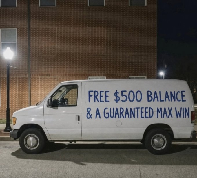 A white van parked at night in front of a brick building displays large blue text reading 'FREE $500 BALANCE & A GUARANTEED MAX WIN' as advertising.