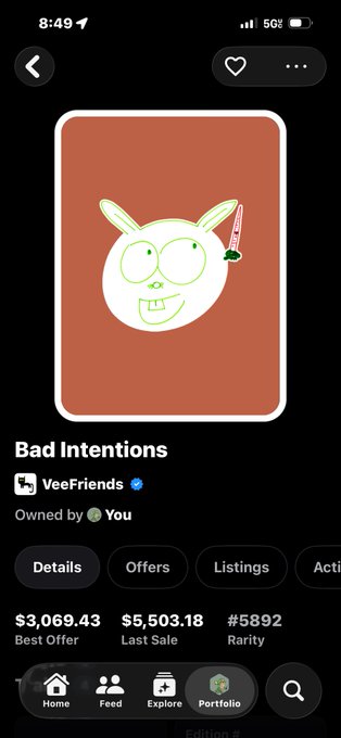 A digital collectible profile page on VeeFriends displays an NFT titled 'Bad Intentions' featuring a green bunny head with a syringe, showing a best offer of $3,069.43 and a rarity rank of #5892.