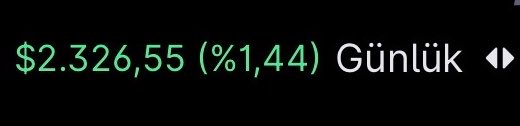 The image displays "$2,326.55 (%1.44) Günlük" in green text, indicating a daily percentage gain of 1.44%. This appears to be a crypto price ticker showing modest daily gains, which contrasts with the post's sentiment about the crypto market feeling "empty" and lacking opportunities compared to active NASDAQ trading.