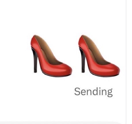 A pair of red high-heeled shoes on a white background with the text "Sending" below them.