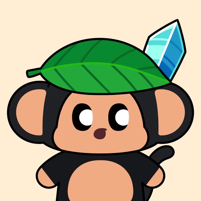 A cute cartoon character of a small black and tan monkey-like creature with large round eyes, a green leaf on its head, and a blue crystal shard.