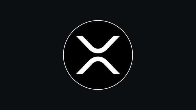 A black screen displaying the white XRP cryptocurrency logo inside a circle, set against a dark gray background.