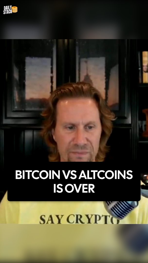A man with shoulder-length hair appears in a podcast-style video frame with the caption "BITCOIN VS ALTCOINS IS OVER" displayed prominently below his face, alongside a "Daily Stack" logo. The visual reinforces Cory Swan's message that the debate between Bitcoin and altcoins has concluded, shifting focus to the broader competition between Bitcoin's network effect and the dollar's.