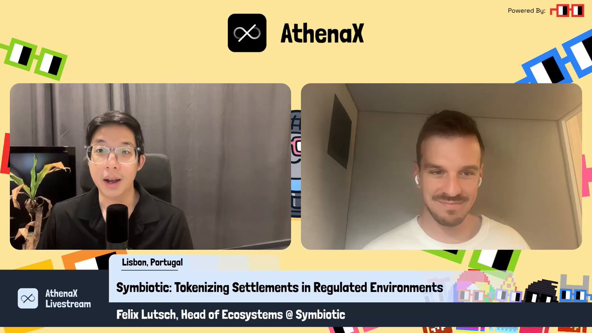 The image shows two men sitting behind microphones, likely participating in a podcast or webinar. They are discussing symbiotic relationships between different ecosystems and how they can be applied to financial markets. The hosts of the show are talking about symbiosis as a way to create more productive and reusable capital across various industries.