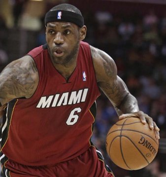 This image shows LeBron James in his Miami Heat jersey, relevant to the post discussing his potential return to Cleveland or signing with another team as reflected by Polymarket odds.