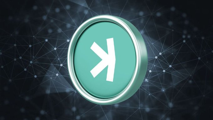 The image features an upward-pointing arrow with the text "KAS" above it, positioned at the top right corner of a button that reads "Upgrading" or "Kaspa", and located towards the center of the image. The backdrop includes a dark blue background filled with small white dots representing interconnected networks or lines.