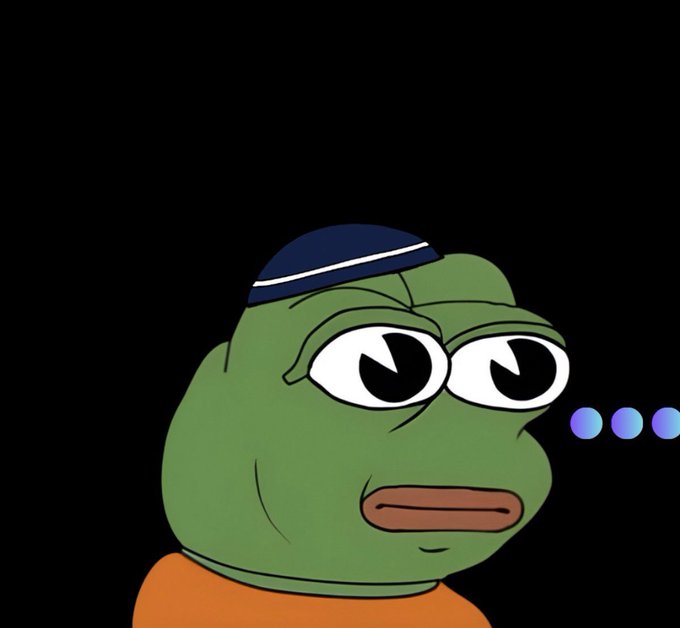 A cartoon green frog character wearing a blue and white beanie and an orange shirt, looking sideways with three blue dots beside it.