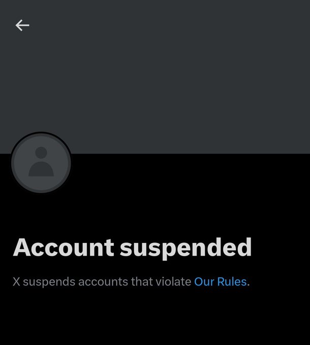 The image shows an email message with a black background, stating that an account has been suspended due to violating our rules. The email also mentions that there are suspenders accounts that violate Our Rules. The text appears to be in a foreign language or written in a different style than what is typically seen on emails.