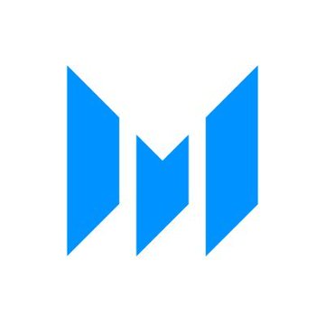 The image features a digital illustration of the currency symbol (M) surrounded by three blue triangles. The M is shown in a stylized form, suggesting that it's part of a news cardano logo. The background of the image is white, with the three blue triangles standing out prominently against this backdrop. In the post, there are several elements related to the currency cardano symbol and its value. They include a reference to the "M" as a currency name (Currency Cardano), the @MessariCrypto, and an update on the price of 24 hours.
