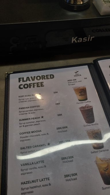 A "Flavored Coffee" menu from a Hova cafe is displayed, listing options like Kopi Susu Royale (25K), Pandan Coffee (26K), Summer Peach, Coffee Mocha, Salted Caramel, Vanilla Latte, and Hazelnut Latte (28K/30K for Hot/Iced), with the post playfully asking followers if they've had their coffee today.