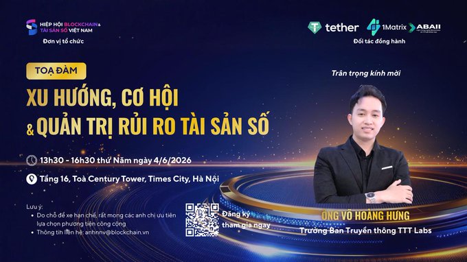 The image features a man standing next to a poster or banner with text written in Vietnamese. The man appears to be smiling for the camera while posing against a blue background that has gold accents, giving the impression of a grand event or celebration. The poster also includes information about an event taking place at a venue named "Tòa nhà Century, Times City, 458 Minh Khai".