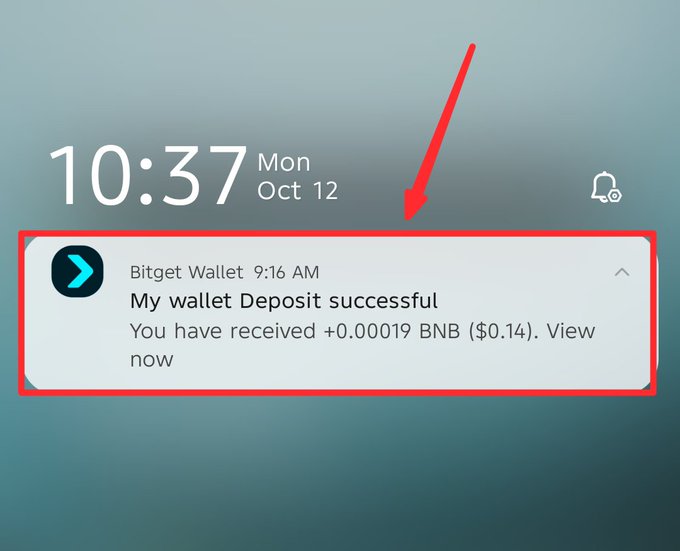 A smartphone lock screen notification screenshot at 10:37 Mon Oct 12, showing a Bitget Wallet alert highlighted with red box and arrow stating 'My wallet Deposit successful - You have received +0.00019 BNB ($0.14).'