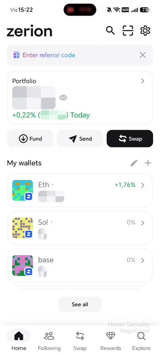 The image shows a smartphone screen displaying an app called "ZERION" with various options for users. The main focus of the app is to invest in cryptocurrency, specifically ZERION tokens. There are several tabs open on the screen, including one tab that reads "Enter refer code", which might be related to sharing information about the app or a specific investment opportunity. The user interface appears to be simple and straightforward, with a clean design and easy-to-understand layout.