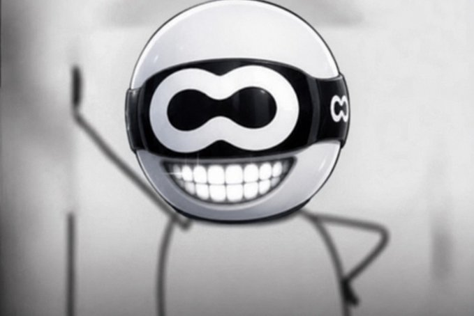 A black-and-white cartoon figure with a wide grinning mouth wears infinity-symbol-shaped sunglasses.