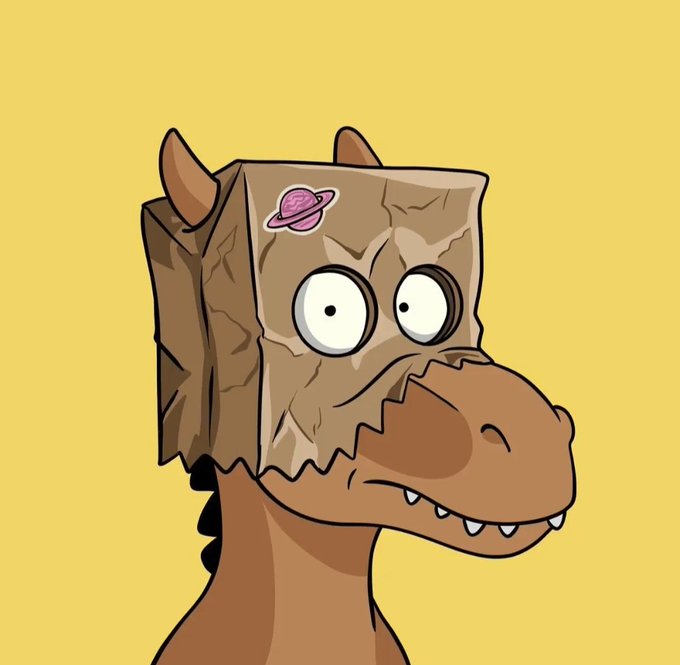 The image features a cartoon dinosaur head wearing a brown paper bag hat, which has a pink planet sticker on its forehead. The dinosaur appears to be wearing a mask or costume that resembles a human face with eyes and a mouth. The background of the image is yellow, creating a vibrant contrast with the brown color of the dinosaur's hat. There are no texts present in the image.