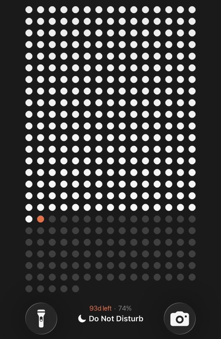 An iPhone control center with the flashlight, camera, and Do Not Disturb (set for 93d 74%) toggles visible, with the orange flashlight icon illuminated.