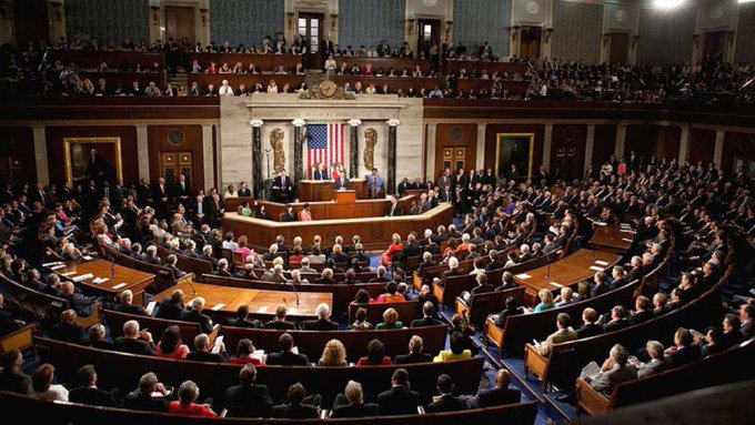 A formal joint session of the U.S. Congress is shown, with members of the House and Senate gathered in the chamber around an American flag at the front. The image pairs with a post urging Republican lawmakers to advance the #Clarity Act in the Senate.