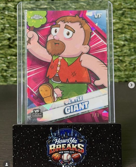A Funko trading card featuring the character 'Gentle Giant' from 'The Flintstones,' displayed in a protective case on a 'HowYa Breaks NYC' stand.