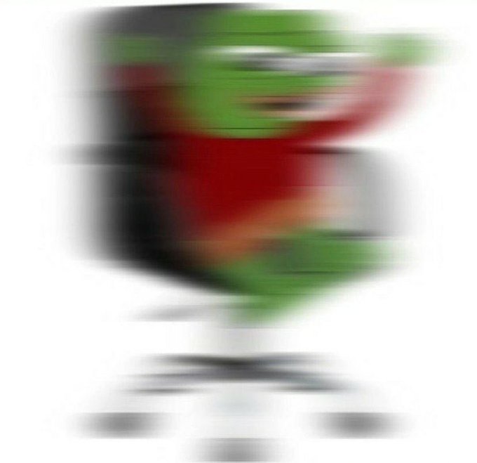 A heavily blurred, pixelated image featuring horizontal streaks of red, green, and black on a white background, making the content unidentifiable.