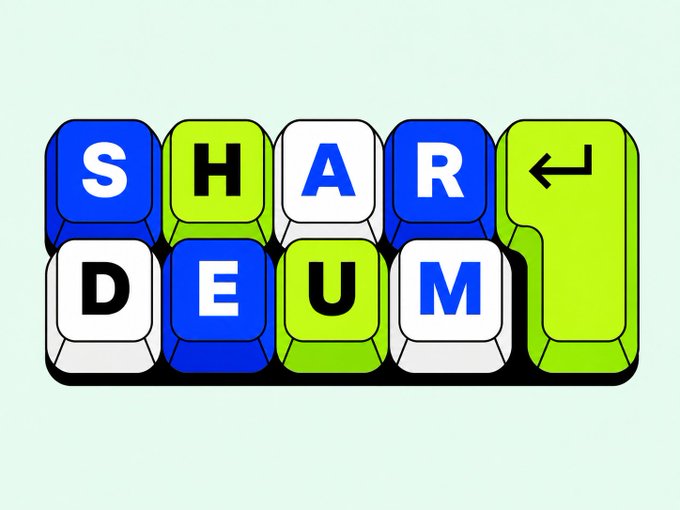 Stylized 3D keyboard keys spell out "SHARDEUM" alongside an enter key, serving as a visual brand representation for the "GM!" greeting. The bold, colorful key design reinforces the Shardeum blockchain project's logo in a playful, tech-inspired format.