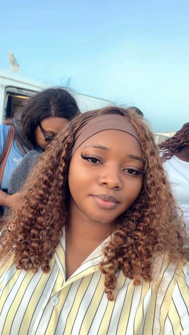 A selfie shows a young woman with curly hair, a headband, and a striped shirt standing near other people and an aircraft. It accompanies a CTNG airdrop post contrasting farmers who connected wallets long ago with newcomers, while the allocation and token launch remain uncertain.