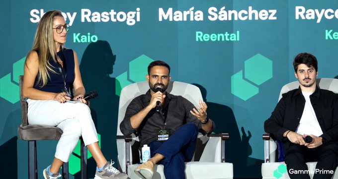 A panel discussion features three seated individuals, with names including 'Shrey Rastogi' (Kaio), 'María Sánchez' (Reental), and 'Rayco' visible on screen, watermarked 'Gamma Prime.'