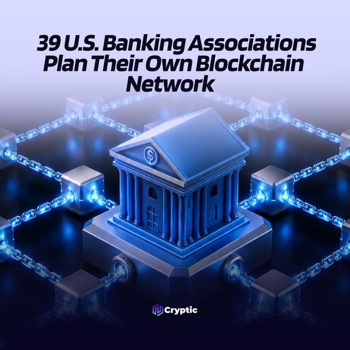 The image features a digital illustration of a blue classical bank building at the center of a glowing blockchain network with interconnected chains and nodes. Overlaid text reads "39 U.S. Banking Associations Plan Their Own Blockchain Network," visually reinforcing the news about 39 U.S. state banking associations forming the "BankChain Alliance" to build a nationwide blockchain infrastructure targeting a 2027 launch.