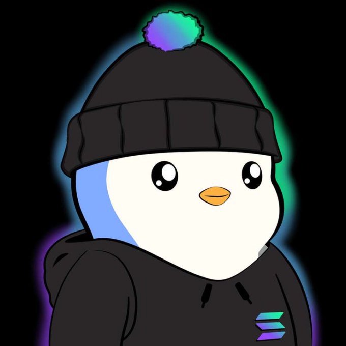 A cartoon penguin wearing a black beanie and hoodie, with rainbow-colored accents and a glowing multicolored pom-pom, stands against a black background.