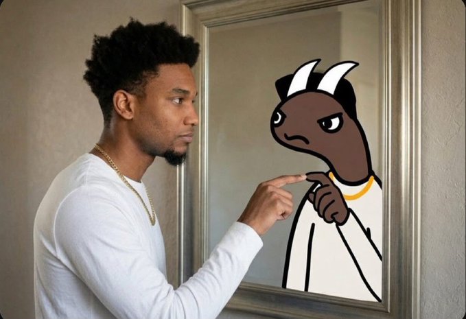 A young man in a white shirt points skeptically at a cartoon goat illustration in a mirror, mirroring the doubt surrounding the "$bullsem" token pitch that's currently sitting at a $50k market cap with ambitious $10M+ projections.