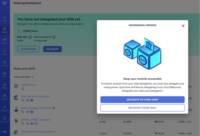 The image features an alert screen on a dashboard of a website or mobile application related to cryptocurrency and digital currency management. The alert displays two blue blocks, possibly symbols for cryptocurrency wallets, with a message that reads "You have not delegated your ADA yet". This could indicate that the user has not yet set up their Bitcoin Wallet, which is a form of digital currency management tool. The post suggests that people should be cautious about the governance updates and consider setting up a Bitcoin Wallet before attempting to access its benefits.