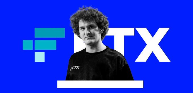 The image shows a man with curly hair wearing a black "FTX" t-shirt, standing in front of a blue background displaying the FTX logo, with the name partially visible as "TX" beside him. This appears to be Sam Bankman-Fried, the former FTX founder, juxtaposed against news of the company he founded now distributing $900 million in its 5th creditor payout, totaling over $9.7 billion returned to creditors at 105%–120% recovery rates.