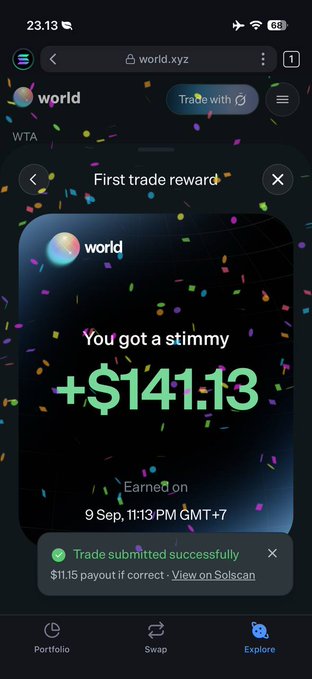 A mobile screenshot of the world.xyz app showing a 'First trade reward' notification with confetti, displaying 'You got a stimmy +$141.13' earned on 9 Sep, 11:13 PM GMT+7, with a success message stating '$11.15 payout if correct'.