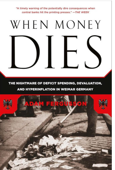 The book cover shown is "When Money Dies: The Nightmare of Deficit Spending, Devaluation, and Hyperinflation in Weimar Germany" by Adam Fergusson, featuring a quote calling it "A timely warning of the potentially dire consequences when central banks hit the printing presses" from The Week. The accompanying post references Weimar 2.0, drawing a parallel between the historical hyperinflation crisis depicted on the cover—where paper currency became worthless enough to be used as fuel on the street—and modern concerns about monetary policy, deficit spending, and potential currency devaluation.