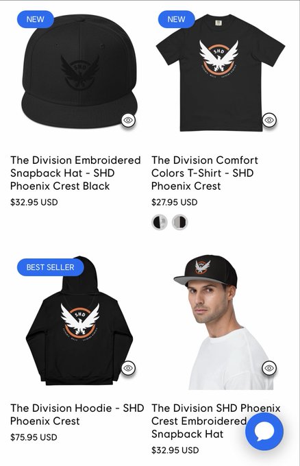 A merchandise store webpage showing 'The Division' branded apparel with an SHD Phoenix Crest, including an embroidered snapback hat ($32.95), a t-shirt ($27.95), a hoodie ($75.95), and another hat.