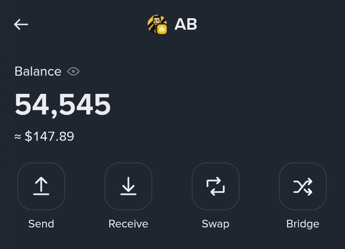 The image shows a crypto wallet interface displaying an AB token balance of 54,545 (≈$147.89), with action buttons for Send, Receive, Swap, and Bridge—confirming the receipt of the 54k+ $AB tokens referenced in the post as a surprise airdrop from the Abracadabra-related project on BNB Chain.