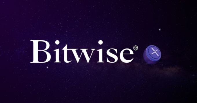 The Bitwise logo is displayed in white text against a starry purple background, featuring the "Bitwise®" name alongside a circular purple XRP token icon. This branding relates to the post by highlighting Bitwise as the issuer of the native XRP ETF that recently surpassed $500 million in assets under management.