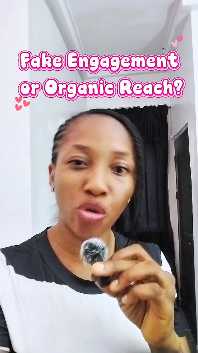 A woman holds a microphone while speaking in a video titled "Fake Engagement or Organic Reach?" displayed in pink bubble text with heart accents.