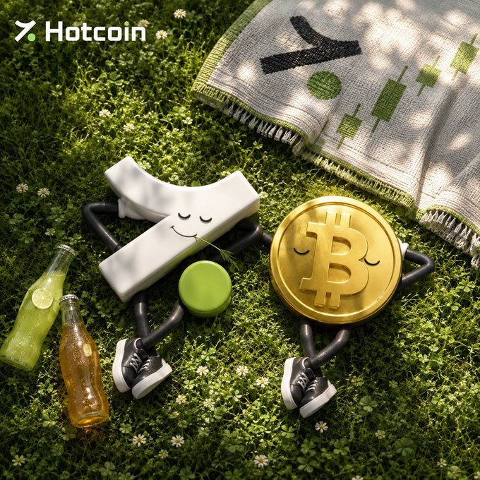 A cute 3D-rendered scene shows an anthropomorphized white letter "Y" and a golden Bitcoin coin with smiling faces, both wearing black and white sneakers, relaxing on a sunny grassy lawn alongside a pickleball paddle, two soda bottles, and a blanket printed with a candlestick chart and the letter "Y" — with the "Hotcoin" logo in the corner, perfectly matching the post's "charts up, Friday mood is easy" vibe by personifying bullish crypto traders enjoying a carefree, picnic-style day as markets rise.
