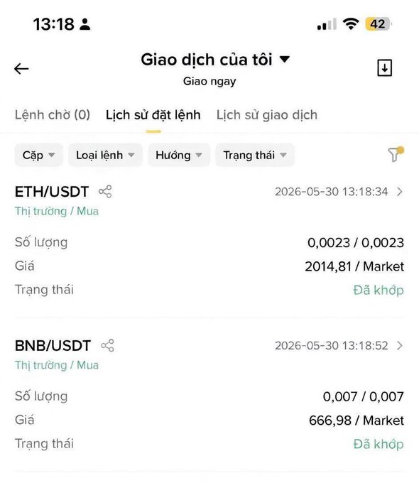 The image features a cell phone displaying information about the stock market, particularly the BNB (Universal bank of Vietnam) and USDT (Uniswap token) markets. The phone screen also has another set of data that includes Bns/usdt exchange rates for these markets in Vietnam. There is an article on the screen with an analysis of the recent performance of these exchanges, which could provide valuable insights into potential investment opportunities or risks associated with these markets.