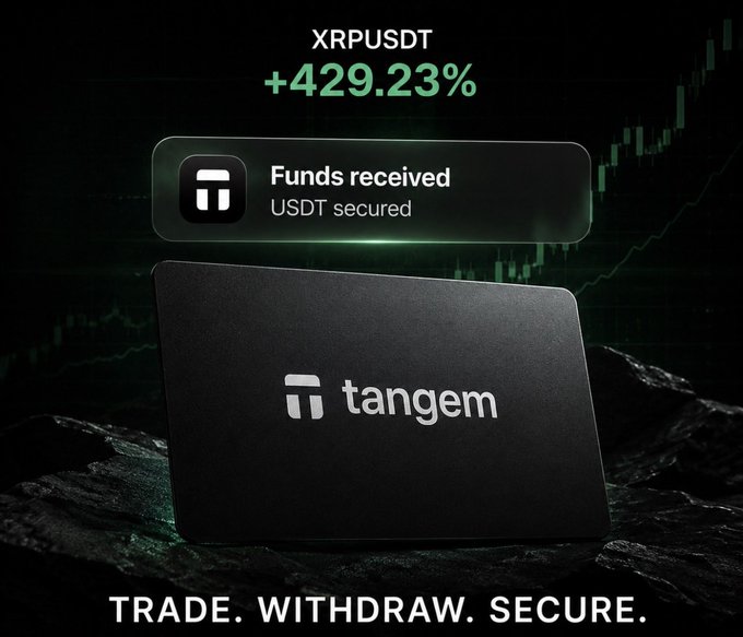 A Tangem crypto hardware wallet advertisement showing 'XRPUSDT +429.23%' and 'Funds received USDT secured' with the tagline 'TRADE. WITHDRAW. SECURE.'