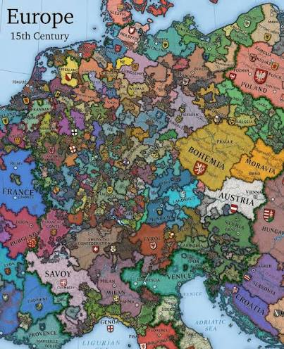 A detailed, colorful map titled "Europe, 15th Century" displays the political divisions of the continent at that time, prominently featuring decentralized regions such as the Swiss cantons, free cities, and small states like the Papal States, Venice, Genoa, and Savoy. The image's depiction of numerous fragmented polities supports the post's argument about decentralization by visually illustrating a historical Europe composed of many small, competing jurisdictions similar to Switzerland's modern canton system.