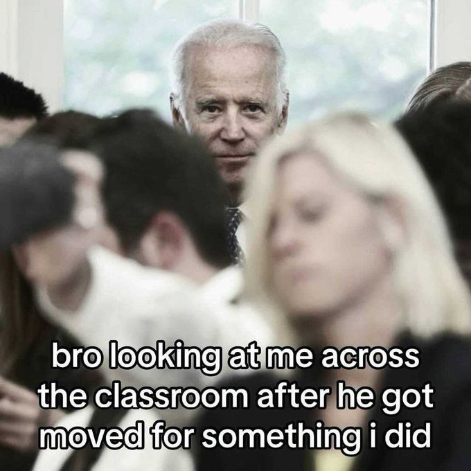 This meme shows Joe Biden looking intensely at the viewer, with text overlayed that reads "bro looking at me across the classroom after he got moved for something i did." The post title "GM Mfers" is a common way to say "Good Morning" in online communities, often used to start the day or a discussion in a casual, sometimes edgy manner, and directly relates to the meme's humorous and relatable scenario.