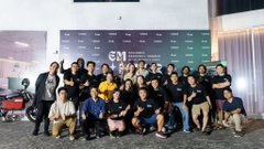 A group photo of a large team posing together in front of a backdrop featuring "GM" text and the Lisk logo, likely taken during a Lisk SEA event before the speaker's departure from the organization at the end of May.