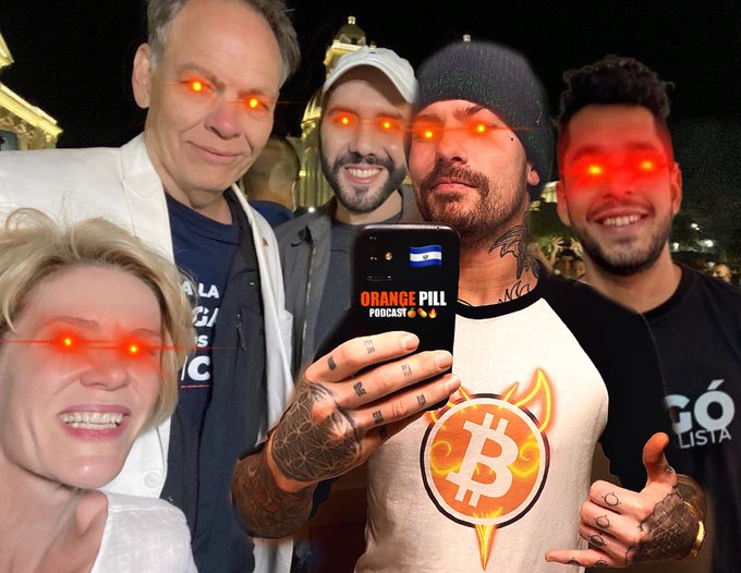 A group selfie with glowing red eyes shows people in a El Salvador setting, one holding a phone displaying "ORANGE PILL PODCAST" and another wearing a shirt with a Bitcoin logo.