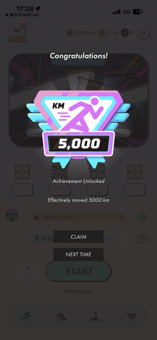 iphone screen displays a fitness app congratulating the user on completing 5,000 steps with a purple and blue logo for "KM" and "Athlete".