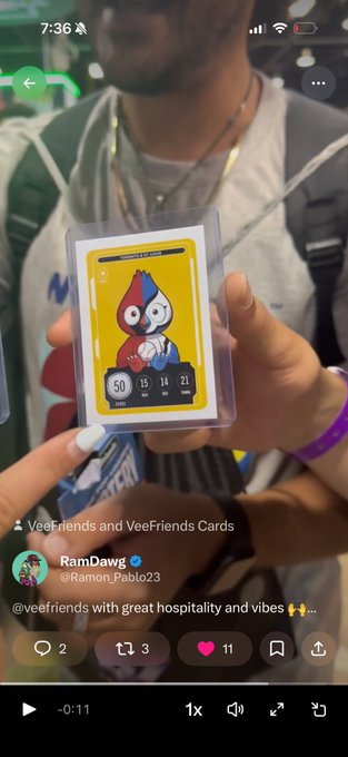 A Twitter/X video screenshot showing a hand holding a 'VeeFriends' collectible card featuring a character with the numbers 50, 15, 14, 21, posted by user @Ramon_Pablo23 (RamDawg) at 7:36.