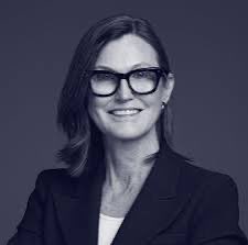 A black-and-white professional portrait shows a smiling woman with dark-framed glasses wearing a blazer, likely representing the analyst or commentator known as "Cassiwood" referenced in the post. The image accompanies text clarifying that Cassiwood only sold about 2% of her ~8 million Bitmine shares, not abandoning her Ethereum-related position.
